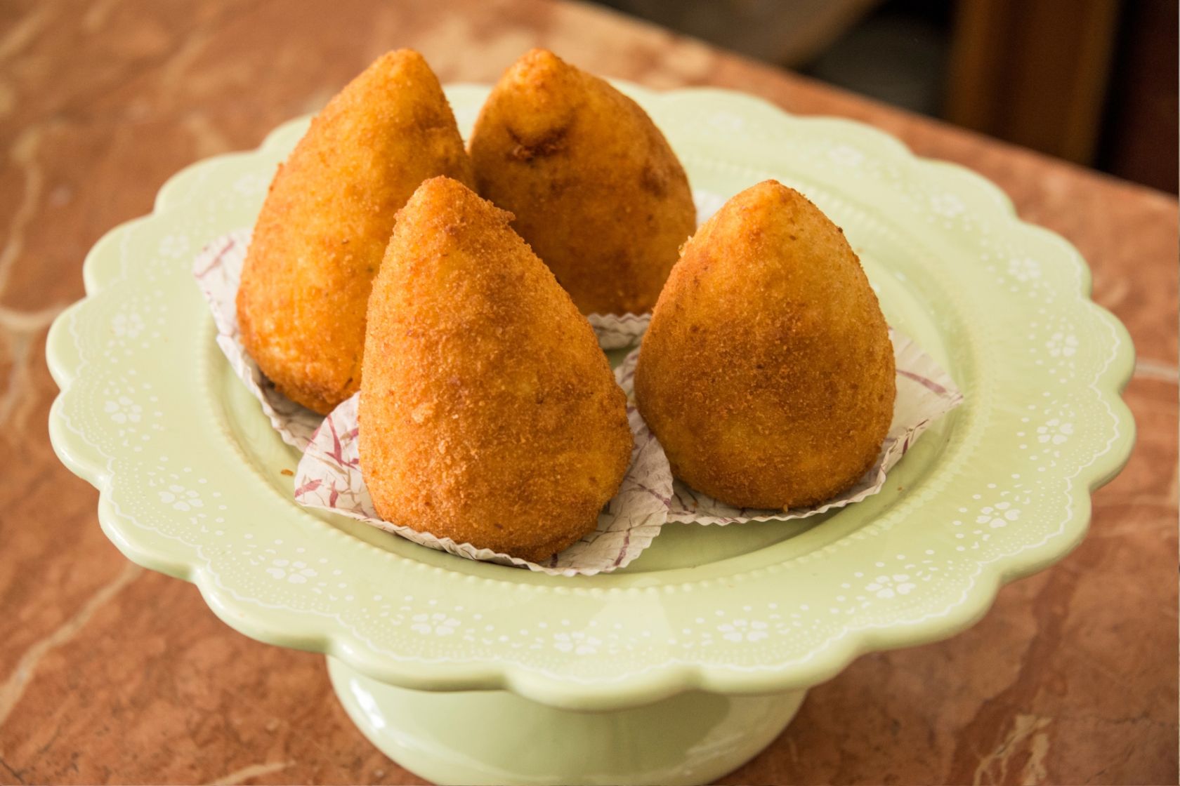 Arancini - in manchen Restaurants findet ihr eine vegane Variante der frittierten Reisbällchen